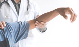 Doctor checking patient with elbow to determine the cause of ill